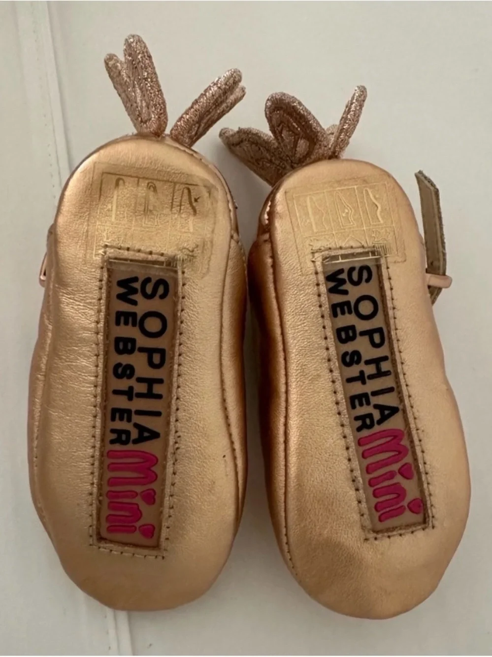 Sophia Webster Mini Rose Gold Mary Jane Shoes with Fairy Wing Bows